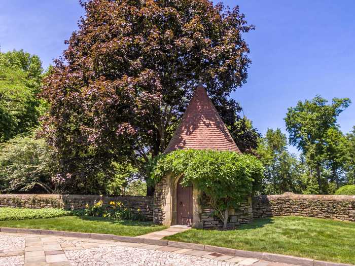 A turreted "tea house" has been converted into a security pavilion, per the listing.