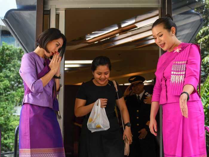 Thai Airways cabin crew, kitted out in their uniforms, are on hand to welcome diners to the experience.