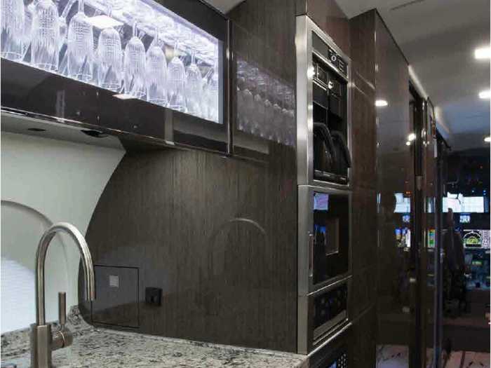 A forward galley offers additional privacy for passengers in the back of the plane.