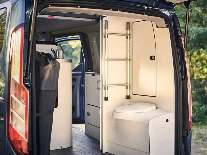 The bathroom, which is located at the rear of the van, has a toilet and sink, although there’s also a sink in the kitchenette area.