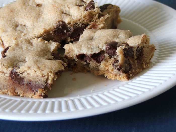 Chocolate chip cookie bars can be warm and gooey in a slow cooker.