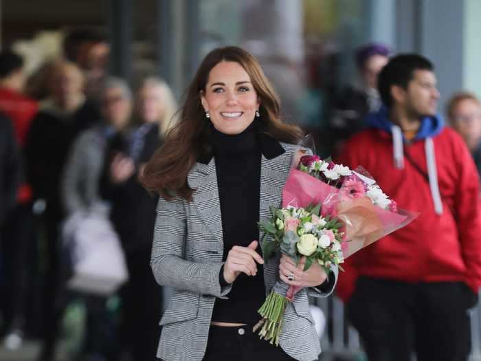 Known to rock a blazer every now and again, Middleton wore this classic grey number with a pair of simple black pants and a turtleneck sweater in 2018.