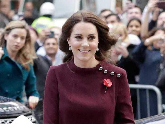 The Duchess of Cambridge wore this comfortable-looking yet stylish maroon sweater dress to an appearance in November 2017.