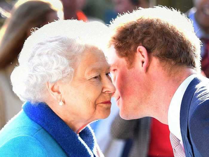 AGE 30: Queen Elizabeth II and Prince Harry attend at the annual Chelsea Flower show at Royal Hospital Chelsea on May 18, 2015 in London, England.