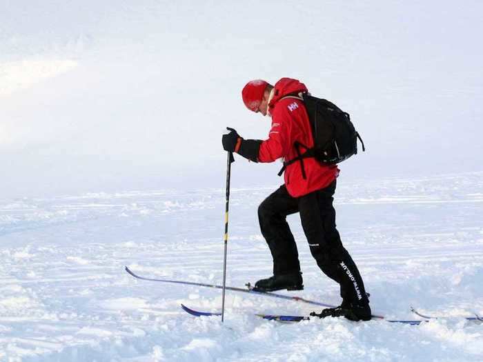 AGE 26: Prince Harry skis with the Walking with the Wounded team before setting off to the North Pole by foot on March 29, 2011 in Spitsbergen, Norway.