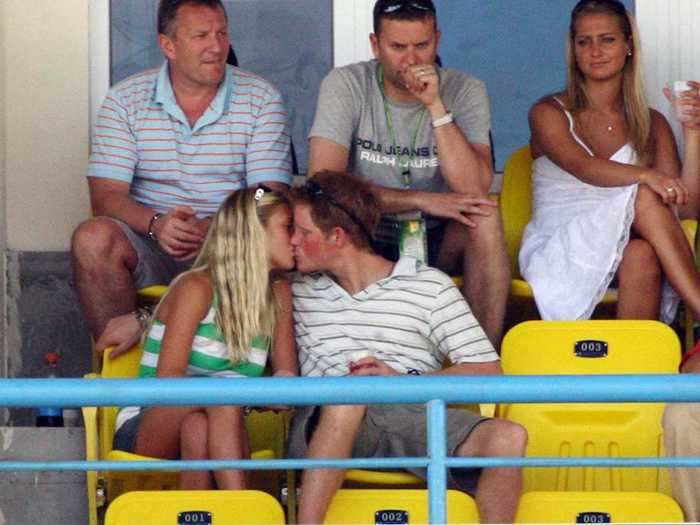 AGE 22: Prince Harry kisses then-girlfriend Chelsy Davy during the ICC Cricket World Cup on April 8, 2007 in St John