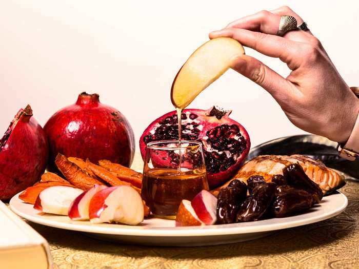 Apples dipped in honey for a sweet new year are a classic Rosh Hashanah treat.