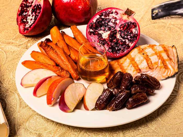 An assortment of symbolic foods are eaten on the holiday as expressions of wishes for the new year.