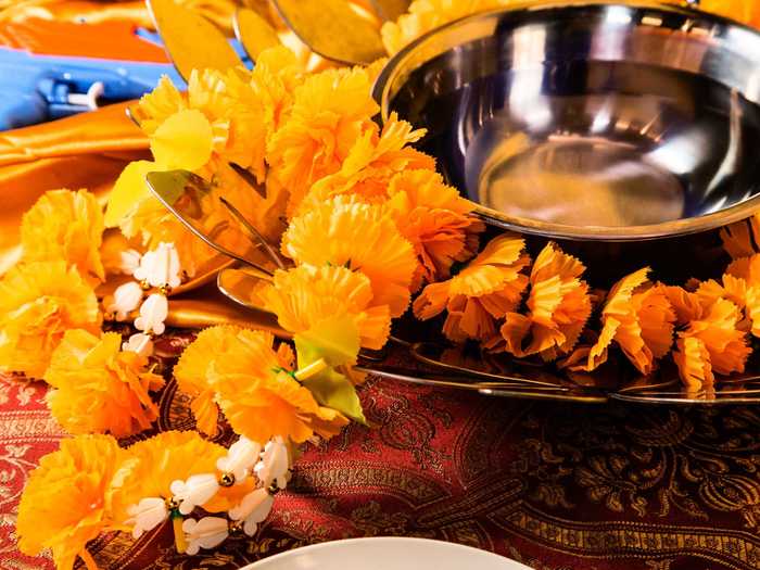 Traditionally, young people visit older family members and perform a water ceremony by pouring water over the elders