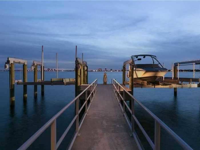 The dock, which comes complete with two boat lifts, is perfect for any water sports enthusiast.