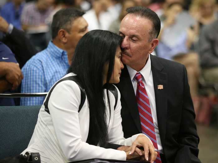 Scarlet Gammon shares an emotional moment with her husband, George, after taking the oath in Los Angeles in 2017.