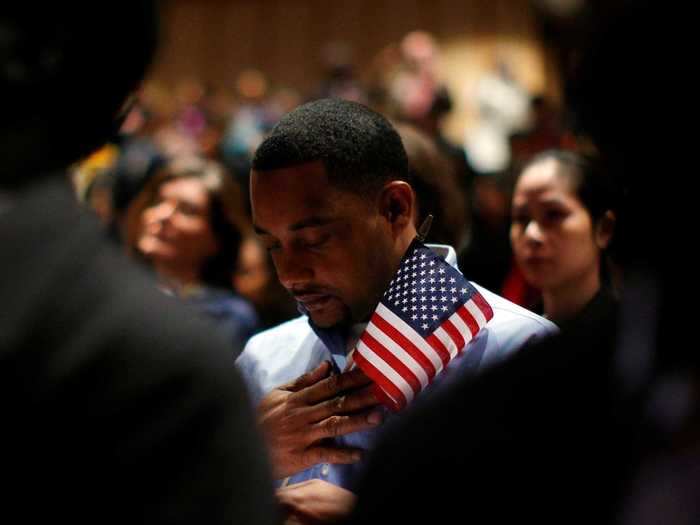 A new citizen has an emotional moment during his ceremony.