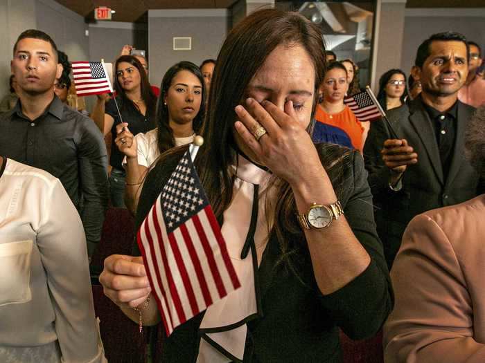 Ileana Gonzalez also holds back tears during a ceremony held at the Everglades National Park in Florida.