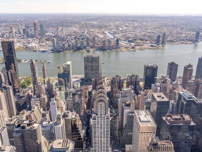 The crown of the Chrysler Building is also visible, along with Roosevelt Island.