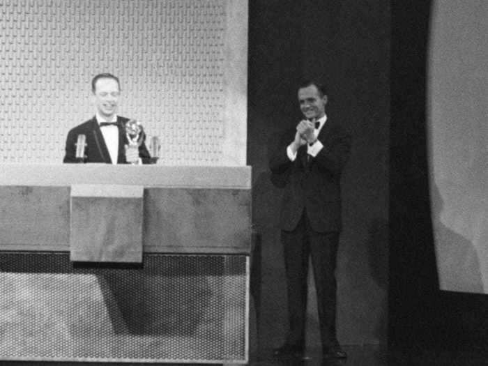 Bob Newhart, pictured here with actor Don Knotts, hosted the 14th Primetime Emmy Awards in 1962. The comedian rocked a classic tuxedo for his hosting duties.