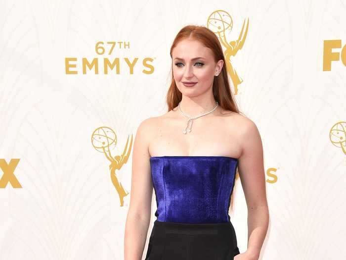 Sophie Turner rocked simple slacks at her first Emmys red carpet in 2015, four years after "Game of Thrones" premiered on HBO and became an instant sensation.