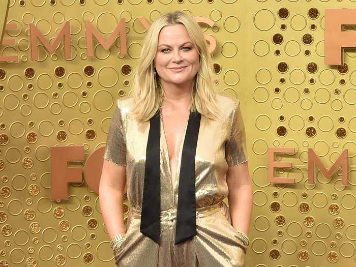 Poehler has amped up her red carpet style in the decades since. At the 2019 Emmys she rocked a metallic gold pantsuit, complete with pockets.