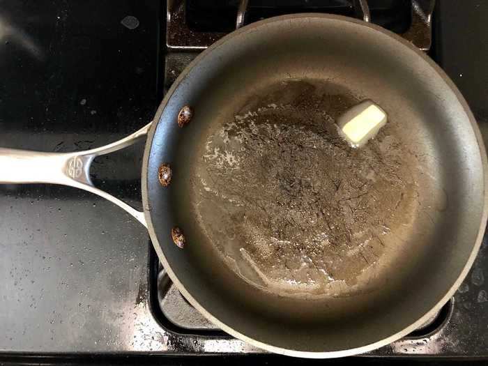 After thoroughly cleaning my pan and running it under cold water, I tried frying an egg with butter.