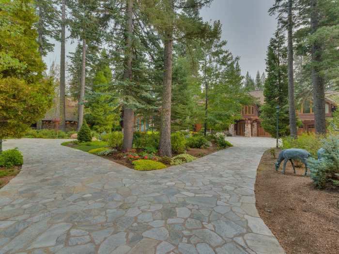 A slate driveway leads up to the $44 million lakefront estate.