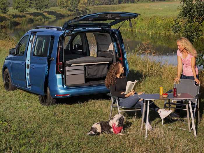 The camper also comes with two chairs and a table, all of which can be tucked away in its designated bag and stored underneath the bed.