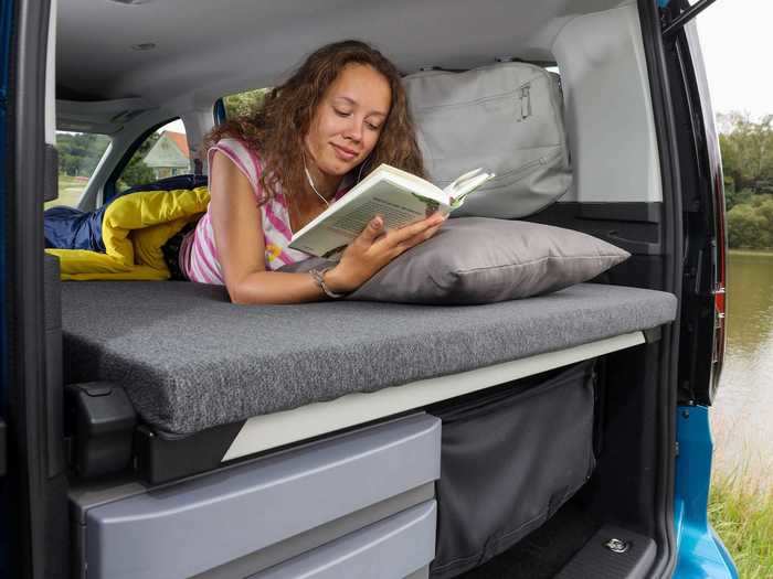 Because the sleeping space folds out and stands on its own legs, the passenger row of seats can be removed for more cargo storage space.