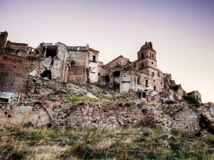 The town of Craco, Italy, emptied in 1963 after landslides and earthquakes made it unsafe to inhabit.