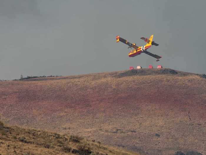 The efforts had seen the fire beaten back over the mountain, but work was still left to be done.