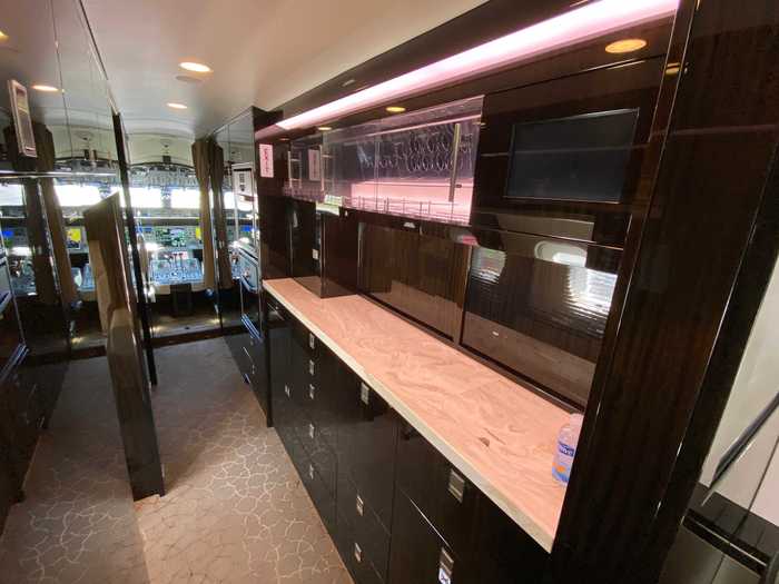 On the opposite end of the aircraft is the forward galley, the main workstation for the cabin attendant where meals and drinks are crafted.