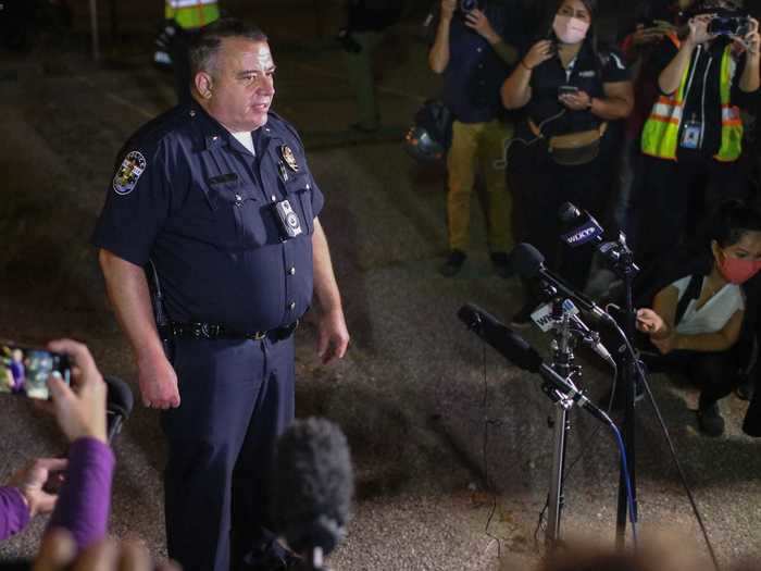 Louisville Assistant Chief of Police Robert Schroeder said that both officers sustained non-life-threatening injuries and a suspect is in custody.