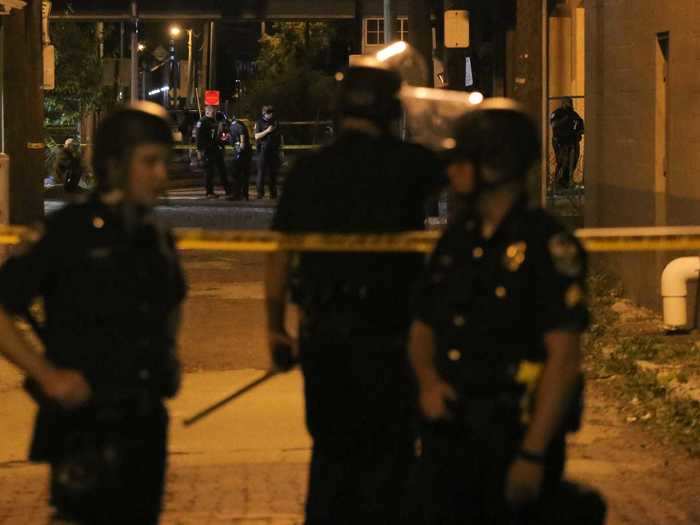 Two police officers were shot in downtown Louisville on Wednesday.