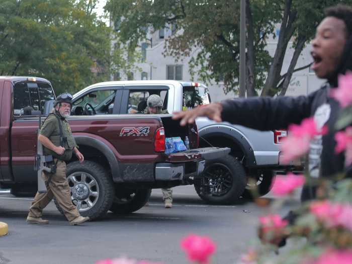 Some protesters tried to reroute the march from the Hampton Inn parking lot, where the Oath Keepers stationed themselves.