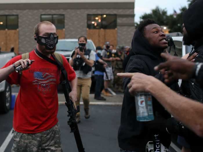 The anti-racism protesters and militia members clashed.