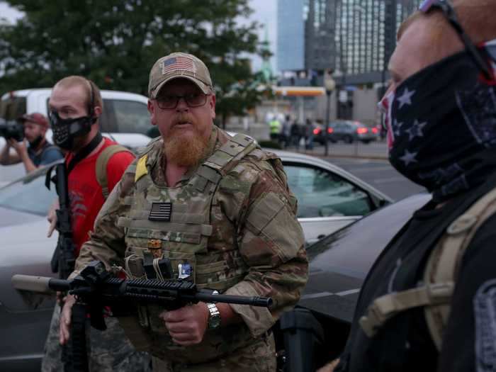 On the second day following the jury decision, Louisville Black Lives Matter protesters were met with armed counter-protesters.