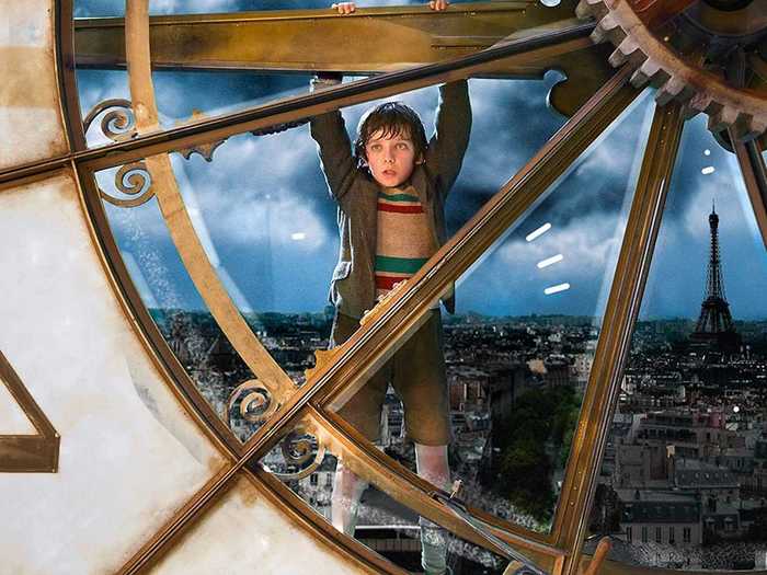 "Hugo" (2011) is a family-friendly film about an orphan solving a mystery left behind by his late father.