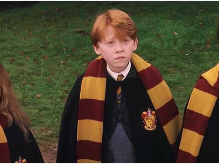 Harry, Ron, and Hermione all wear their scarves in different ways, reflecting their personalities.