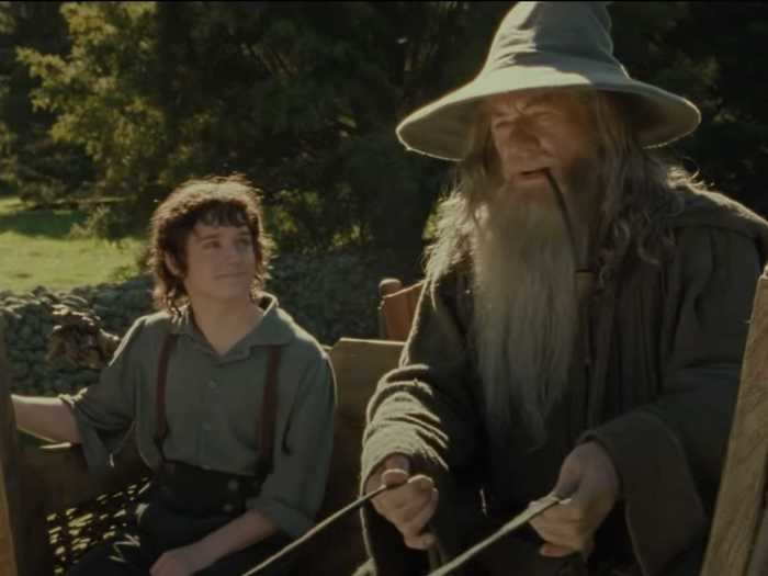 The second technique used was forced-perspective. In this scene, Elijah Wood and Ian McKellen were really sitting together in that cart — but Wood is several feet behind McKellen.