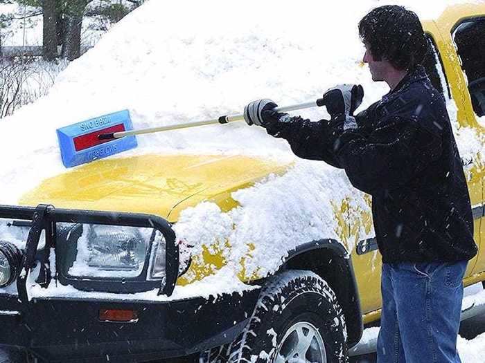 The best tool for clearing deep snow off cars