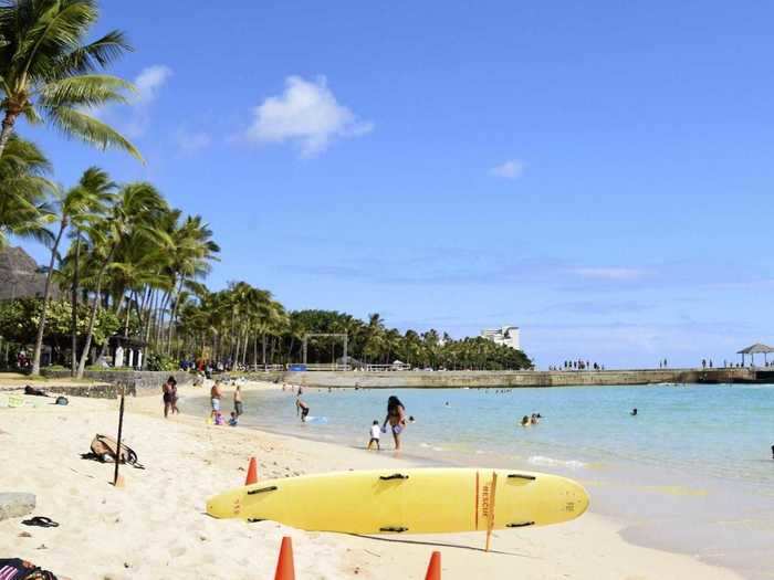 In Hawaii, locals and visitors still head to the beach.