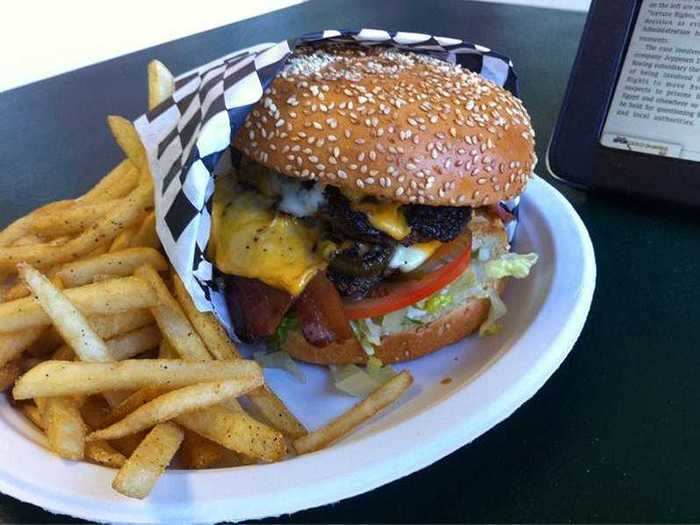 Stack your burger with a tower of toppings at Original Tommy