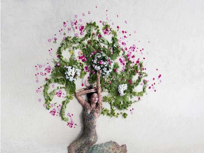 Mohamed Azmeel used leftover flowers and leaves from a wedding to make his subject look like a palm tree in "Tropical Bride."