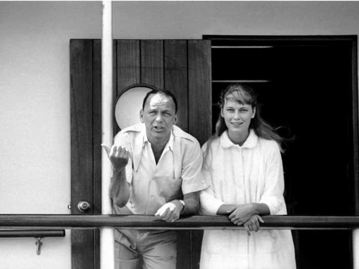 Frank Sinatra with Mia Farrow aboard the yacht Southern Breeze in 1965, a year before they got married.