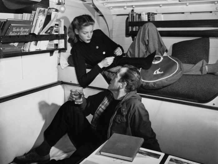 Humphrey Bogart and Lauren Bacall on a yacht circa 1955, two years before his death.