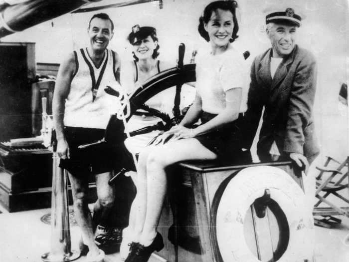 Charlie Chaplin (far right) and his third wife (second from right), Paulette Goddard, on the yacht Invader to Catalina Island in 1934 with fellow actors Franklyn Ardell and Norma Shearer.