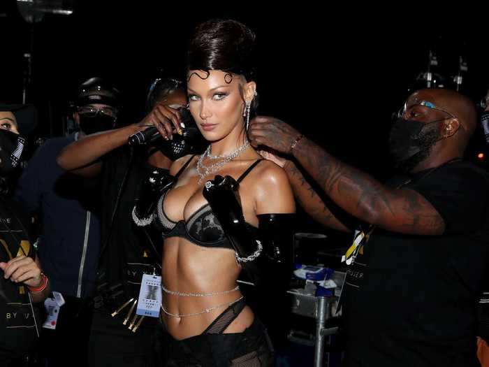 Bella Hadid was dripping in jewels, including a diamond belly chain, as she returned to Rihanna