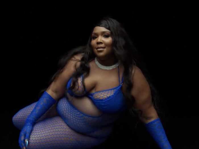 Lizzo made her Savage X Fenty debut in an all-blue look that included a bra, fishnet stockings, and lace gloves.