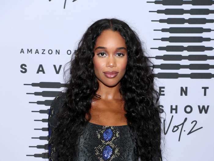 Laura Harrier wore a snake-print crop top with matching pants.