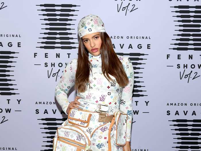 Rosalía looked ready to take the stage in a head-to-toe white outfit that was reminiscent of the Louis Vuitton x Takashi Murakami collaboration.