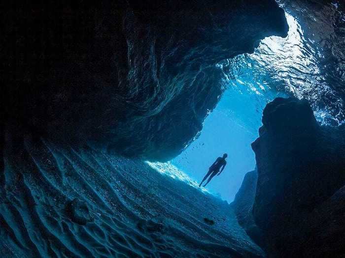 Marc Henauer also won an honorable mention with a photo of this otherworldly underwater cave in Amorgos Island, Greece.
