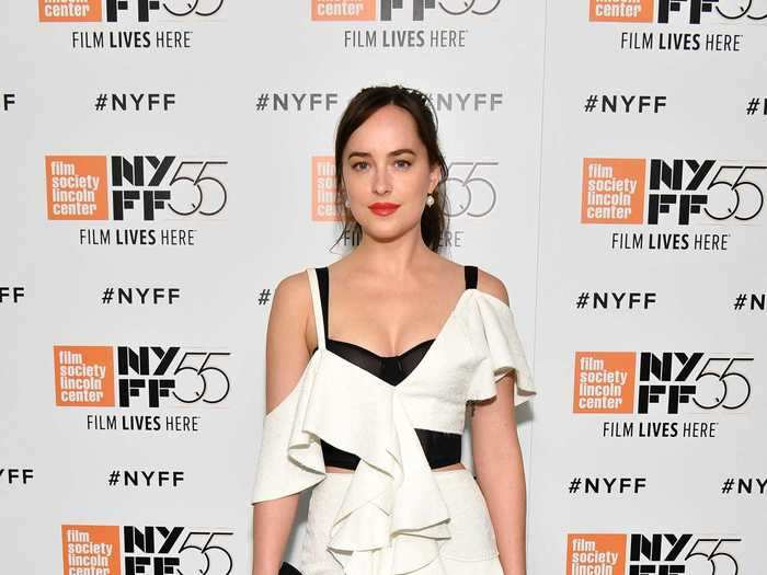 In October 2017, Johnson stepped out at a screening for "Call Me by Your Name" wearing a black and white outfit with black heels and a black clutch.