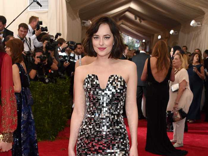 At the 2015 Met Gala, Johnson wore a futuristic black and silver Chanel Haute Couture minidress, with bold eyeliner and her hair in a short style.